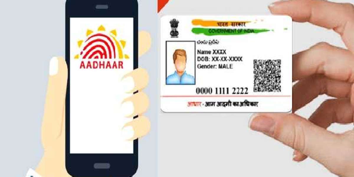 How much does it cost to change a photo on an Aadhar card?
