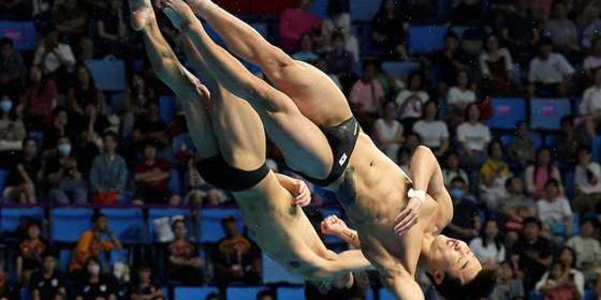 Diving's Uharam wins silver in synchronized 3m